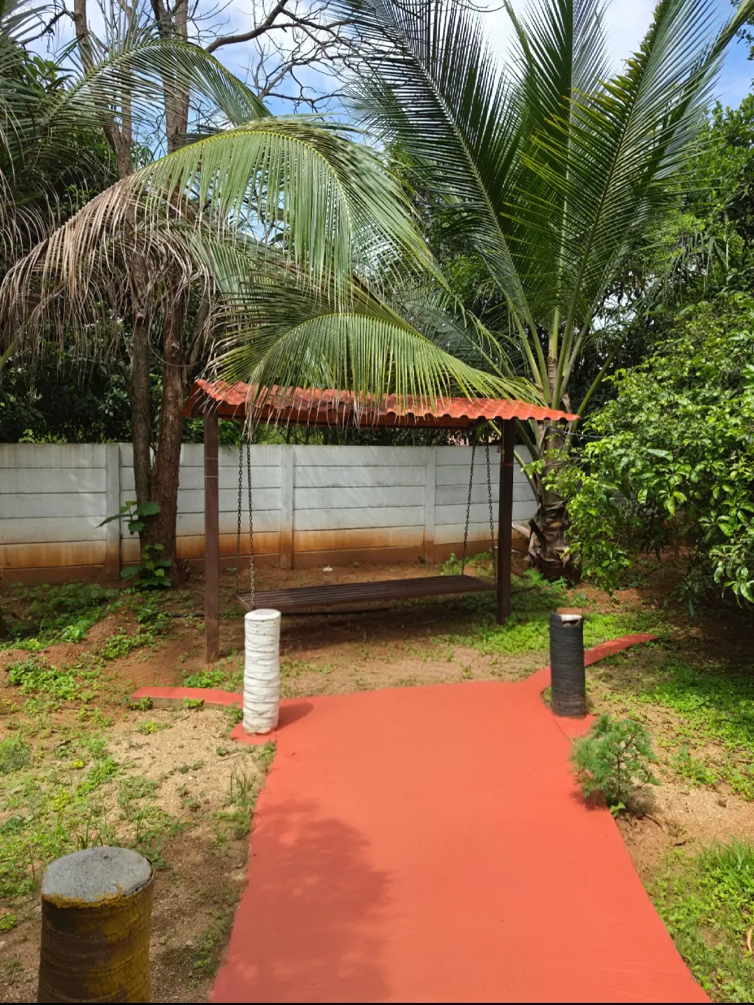 Traditional swing in a quiet green corner