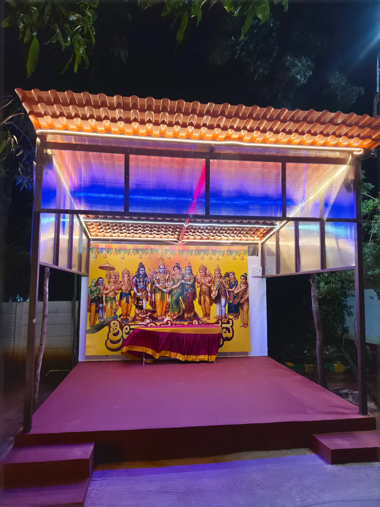 Illuminated ceremonial stage at Ram Vishranti Dhama